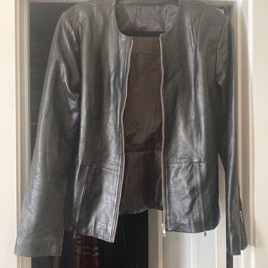 Size 6/8 black leather jacket. Never worn and like new.